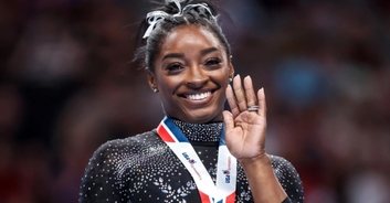 Simone Biles makes history as she wins gymnastics championship for 8th time