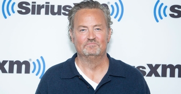 Fans flood the iconic 'Friends' apartment building in NYC with tributes for Matthew Perry