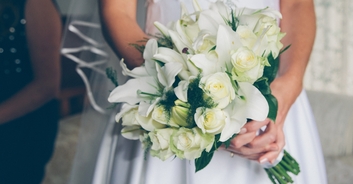 Pregnant bride gets married in hospital bedsheet dress after going into labor early