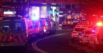 Heartbreaking footage shows father covering his children's eyes with masks during deadly Sydney stabbing spree