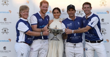People rush to defend Meghan Markle after she's accused of asking a lady not to pose next to her husband Prince Harry
