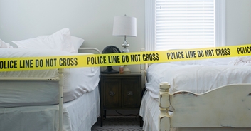 Man arrested after his mother is found 'fused' to maggot-infested bed