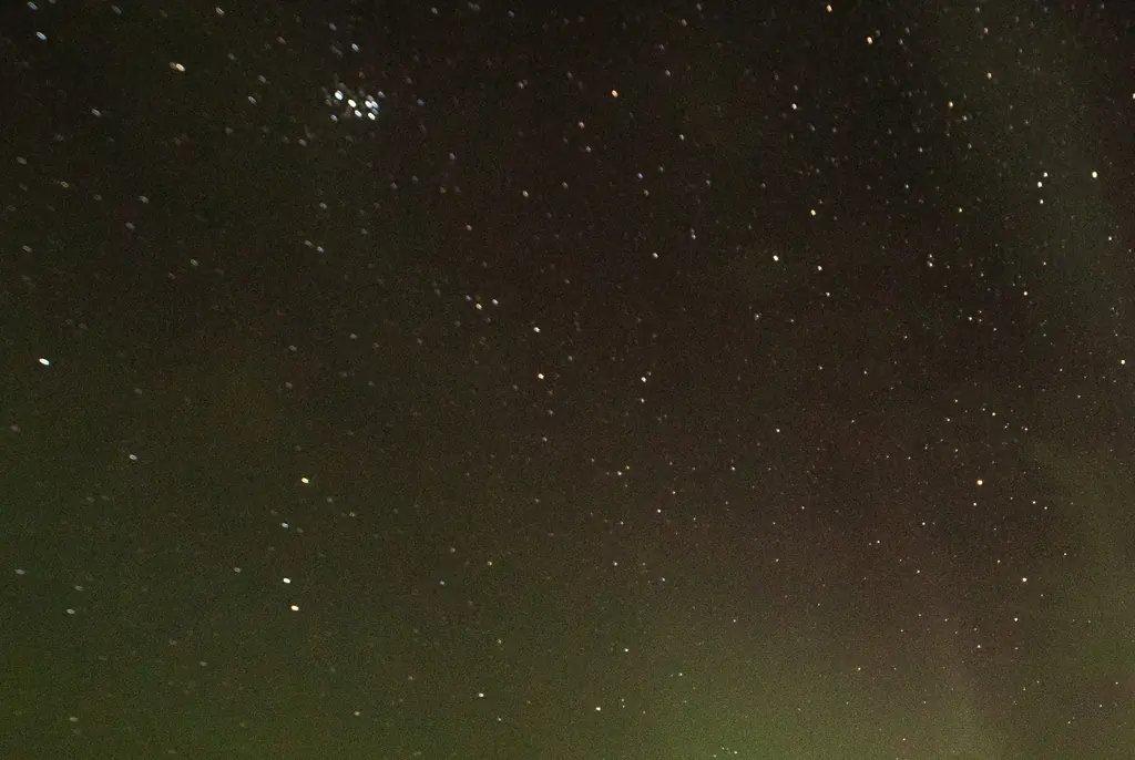 Your phone has several modes to capture the best pics of the lights. Credit: StockPlanets / Getty