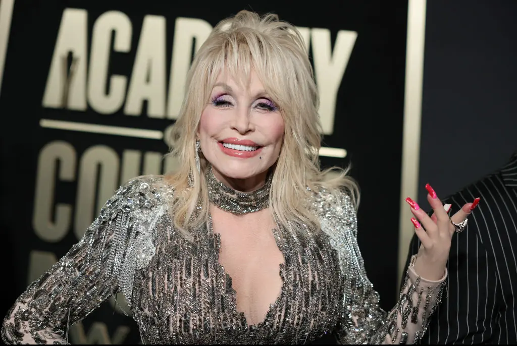 Dolly Parton has shared a rare photo with her lookalike sister. Credit: Theo Wargo/WireImage/Getty Images 