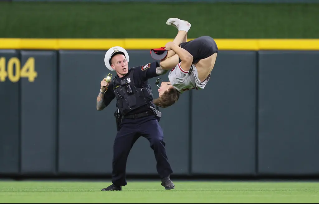 The fan pulled off an impressive backflip being being tased. Credit: Andy Lyons / Getty