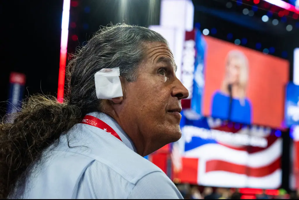 Arizona delegate Ray Michaels wears an ear bandage in solidarity with Donald Trump. Credit: Tom Williams/CQ-Roll Call, Inc/Getty