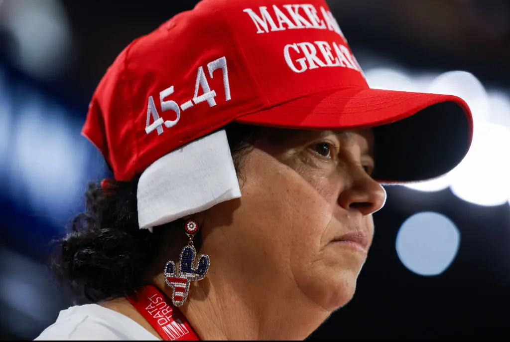 Arizona delegate Stacy Goodman wears a 'bandage' on her ear on the third day of the Republican National Convention. Credit: Joe Raedle/Getty