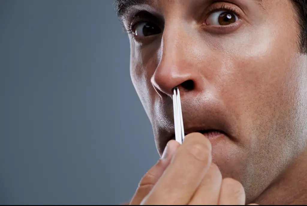 It turns out that using a tweezer for nose hair isn't advised! Credit: PeopleImages/Getty