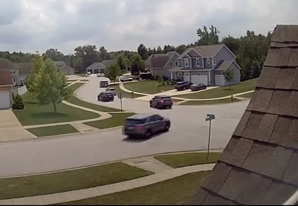 Home security footage shows authorities arriving at Wilson's home. Credit: WGN News