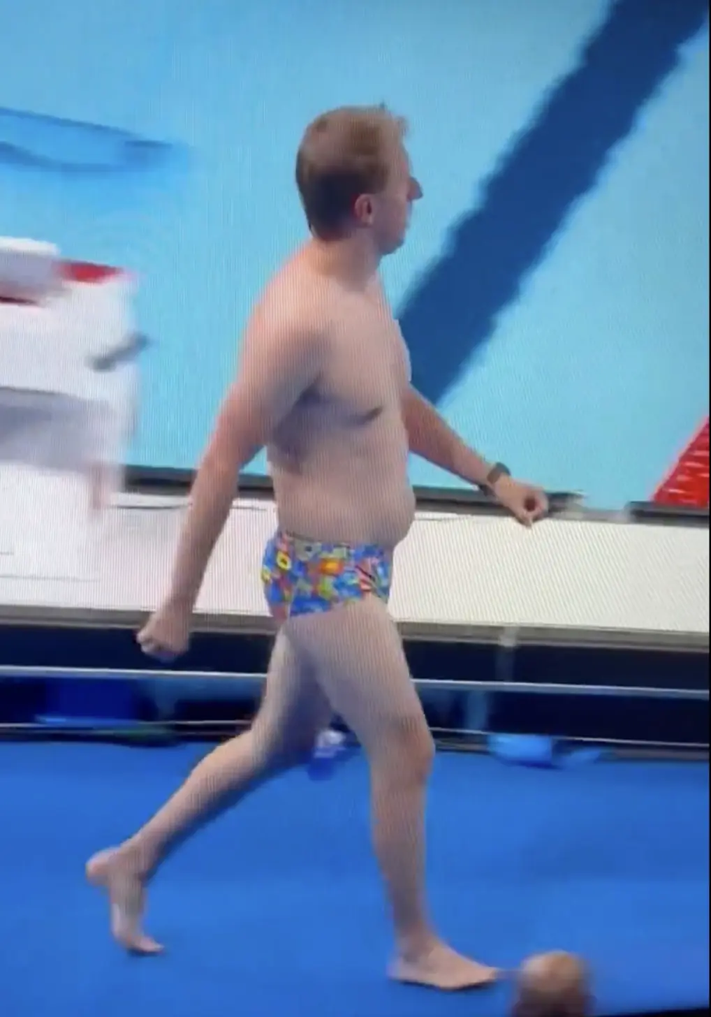Man with 'dad bod' in brightly-colored Speedos steals the show at Paris Olympics as viewers dub it 'funniest moment' - Article Image 4
