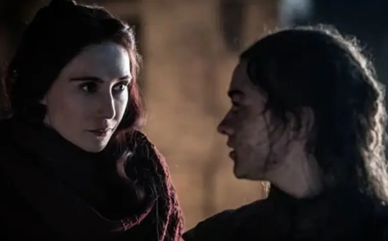 Melisandre telling Arya her prophecy. 