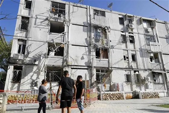 rocket fire damaged building in Ashkelon near the Gaza border.