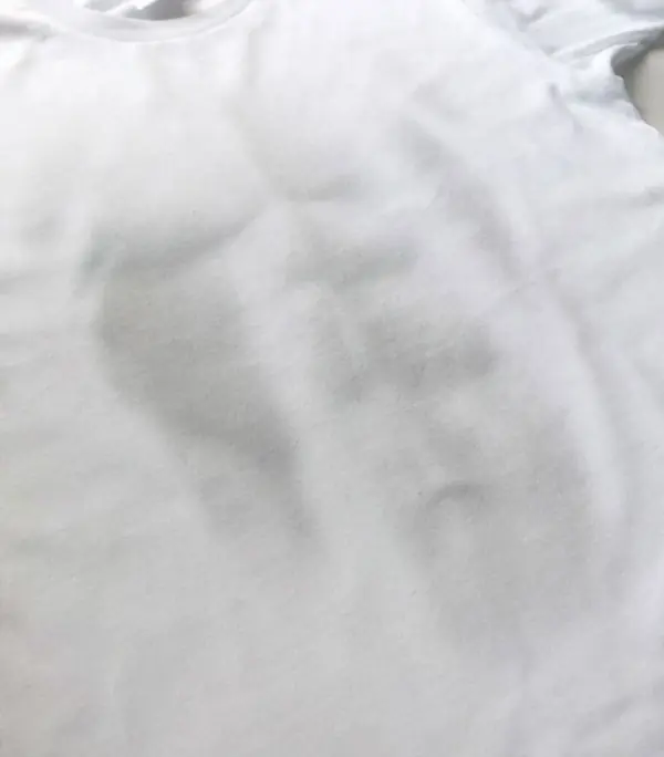 Fake abs on a white t-shirt.