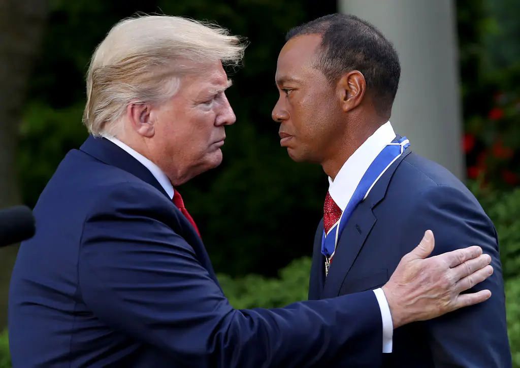 WASHINGTON, DC - MAY 06: U.S. President Donald Trump presents professional golfer and business partner Tiger Woods with the Medal of Freedom during a ceremony in the Rose Garden at the White House May 06, 2019 in Washington, DC. Trump announced he would give the nation’s highest civilian honor to Woods, 43, in honor of his Masters victory last month. (Photo by Win McNamee/Getty Images)