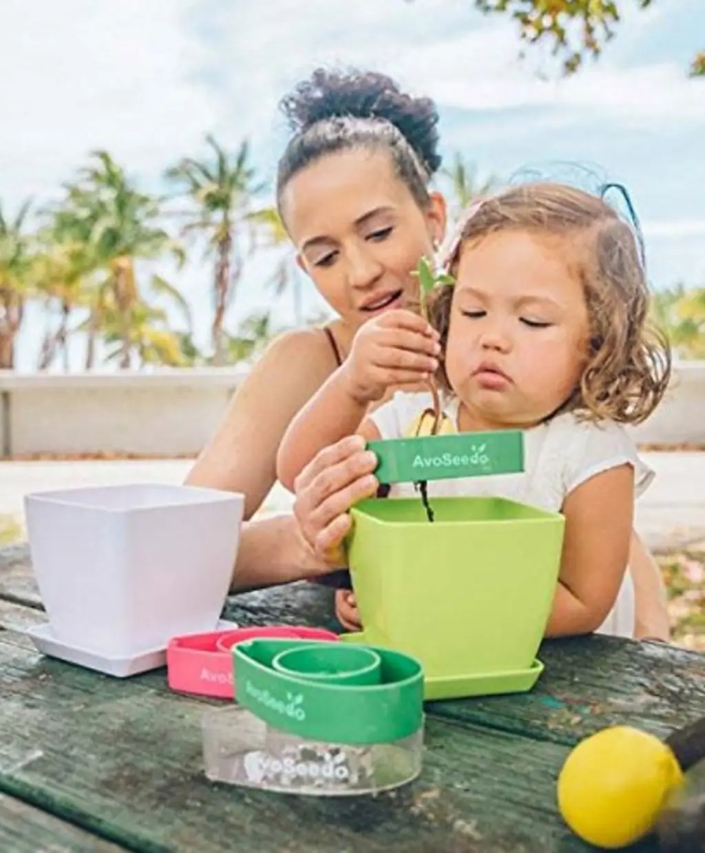A mom and daughter using an AvoSeedo.
