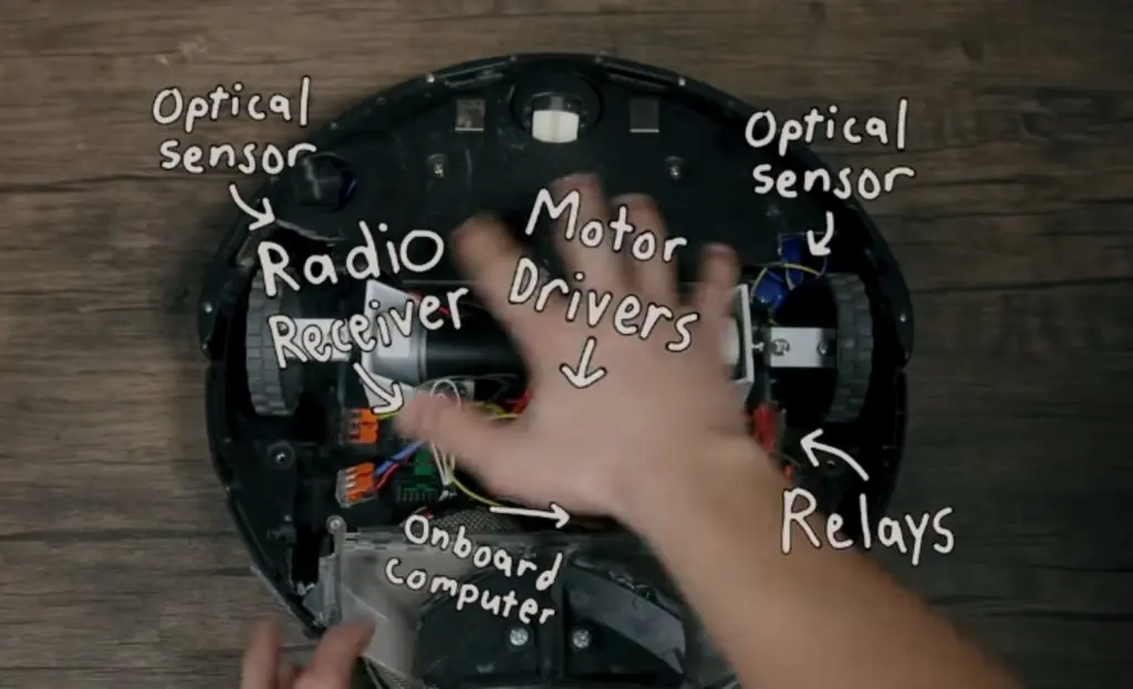 Michael Reeves' complicated rewiring of a Roomba robot.