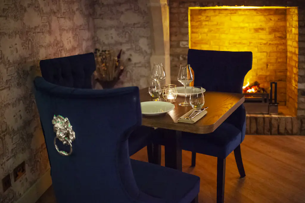 Peter Joseph Kahani restaurant review, London: a small table in front of the fireplace