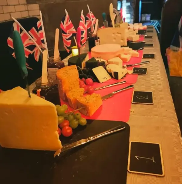 A selection of numbered cheeses. 