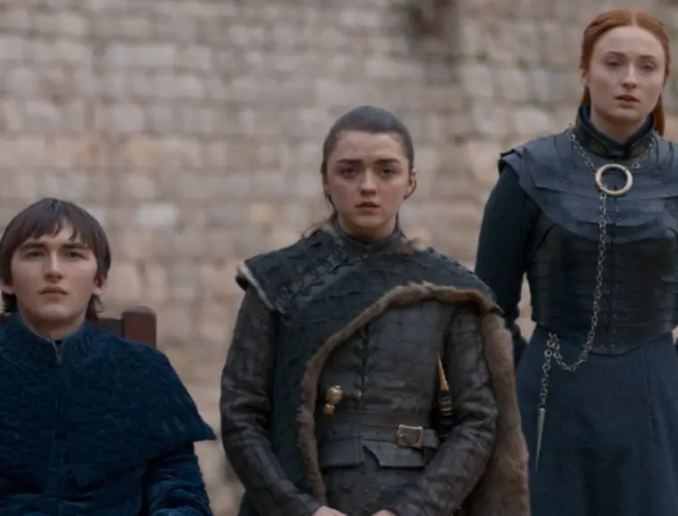 Sansa, Arya and Bran watching Jon sail away.