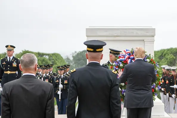 President Donald J Trump lays a wreath at the Tomb of the Unknown Soldier accompanied by Secretary of Defense James N Mattis and Chairman of the Joint Chiefs of Staff Marine Gen Joseph F Dunford Jr Memorial Day ceremony, Arlington National Cemetery, Virginia, May 28, 2018. Image courtesy Sgt. Amber Smith / Office of the Secretary of Defense Public Affairs. (Photo by Smith Collection/Gado/Getty Images)