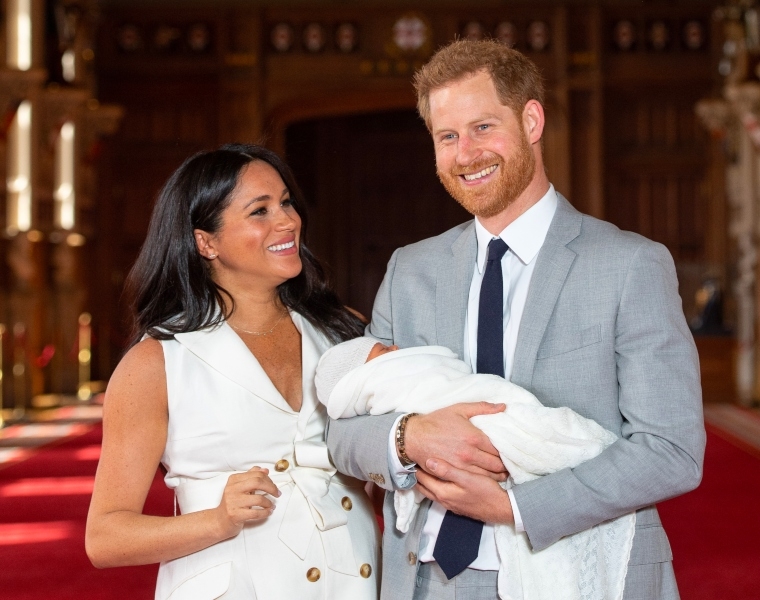 Meghan Markle, Prince Harry and their newborn son.
