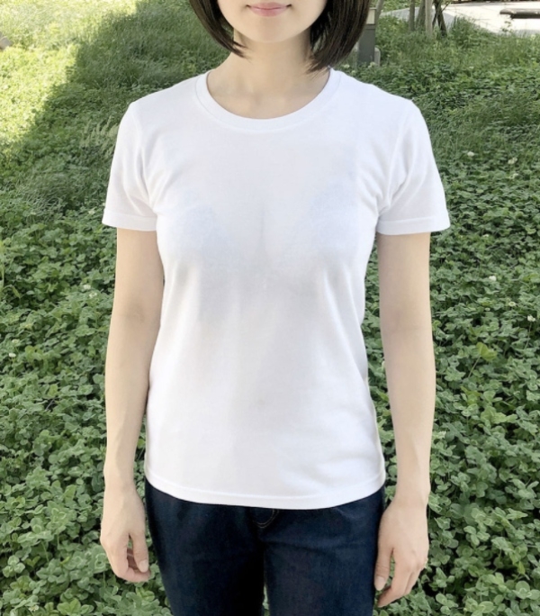 Another image of a woman wearing a seemingly see-through shirt.