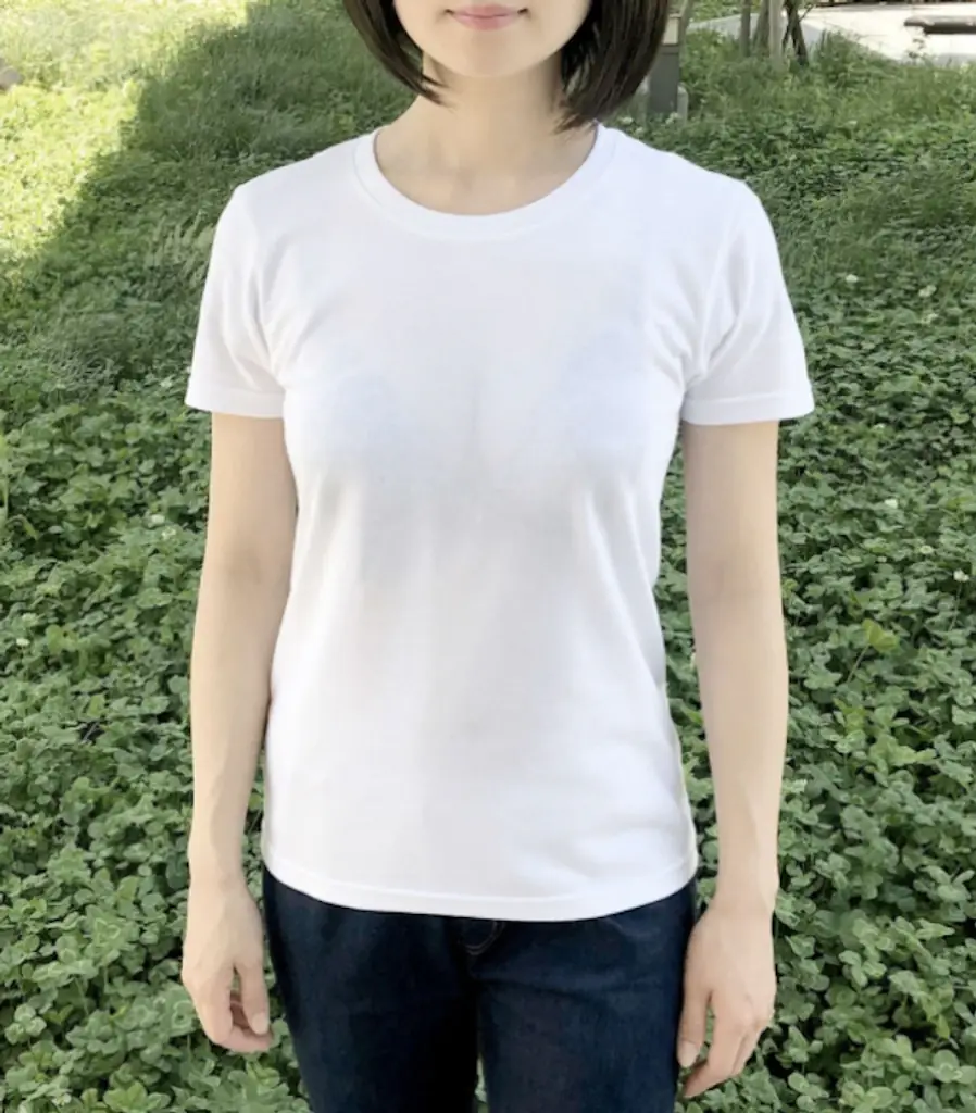 Another image of a woman wearing a seemingly see-through shirt.