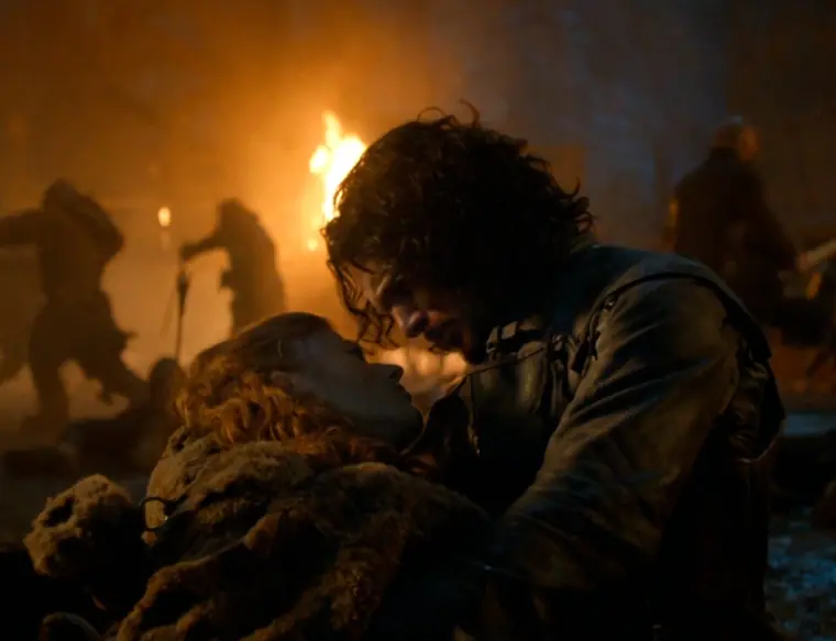 Jon Snow holding Ygritte's body.