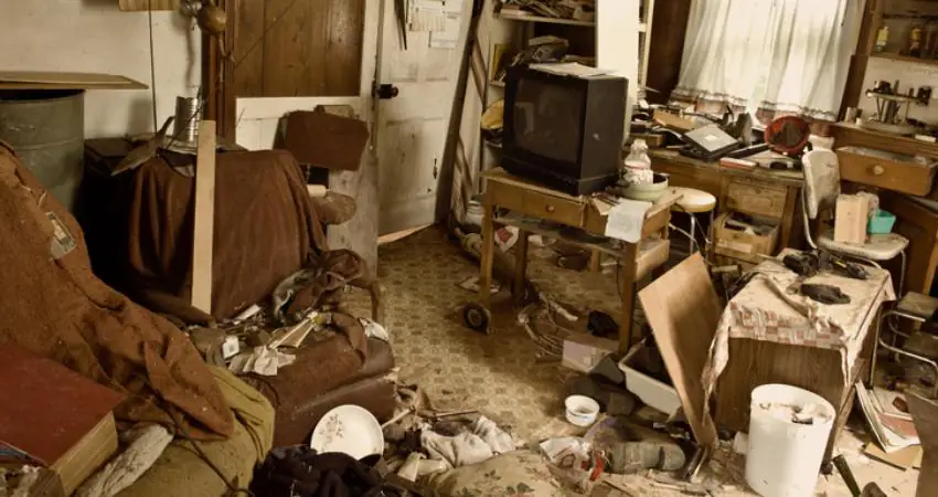 Extreme hoarder is forced to urinate in bottles because she can't get to her bathroom