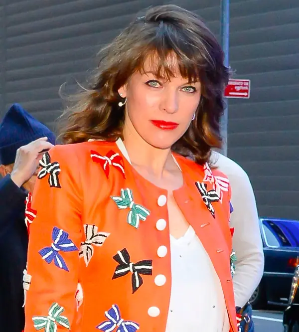 Mila Jovovich wearing red lipstick. 
