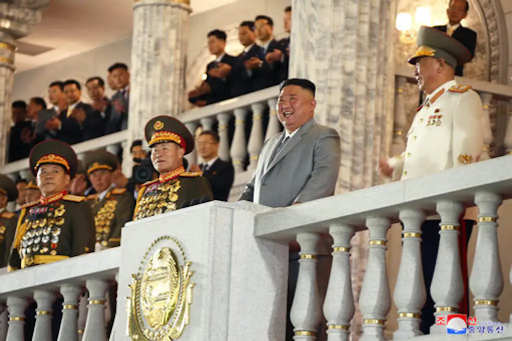 North Korean leader Kim Jong-un (2nd from R) watches a military parade at Kim Il-sung Square in Pyongyang on Oct. 10, 2020, to mark the 75th founding anniversary of the Workers' Party, in this photo released by the North's Korean Central News Agency. (For Use Only in the Republic of Korea. 