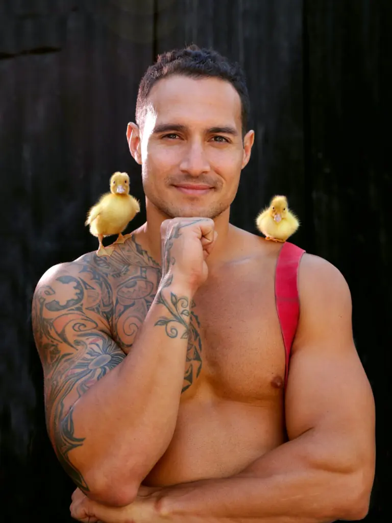 Firefighter Lloyd wich chicks Baxter and Bubba.These salacious yet cute images depict hunky Australian firefighters posing with some of the most adorable animals Australia has to offer, for a caldendar all in the name of charity. See SWNS story SWBRcalendar. This saucy 2021 calendar depicts hunky Australian firefighters posing with some of the most adorable animals Australia has to offer. Now in its 28th year, the world’s most popular calendar is back for 2021. And after the year we’ve all had, the Australian Firefighters Calendar is certainly a sight for sore eyes. The annual calendar sets out to change the mood of doom and gloom from the past 8-months. 2019 and early 2020 was a particularly devastating time, and the world grieved with Australia as they suffered through catastrophic bushfires, and an estimated loss of 1 billion animals from the diverse native wildlife. While the fires may have gone, the destroyed bushland has made it impossible for many of the displaced wildlife to return to their natural habitat.
