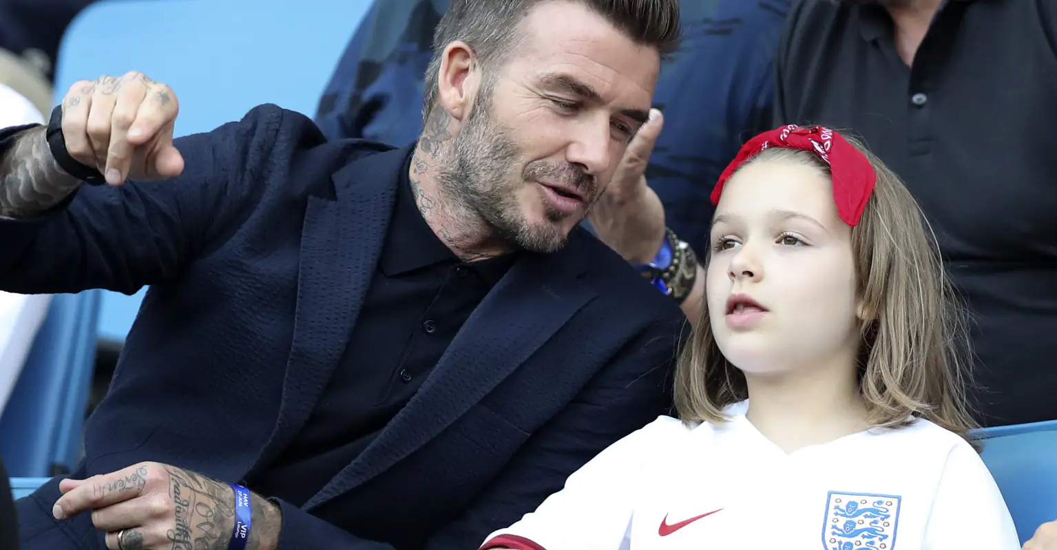 Fans defend David Beckham after he is trolled for kissing daughter on the lips