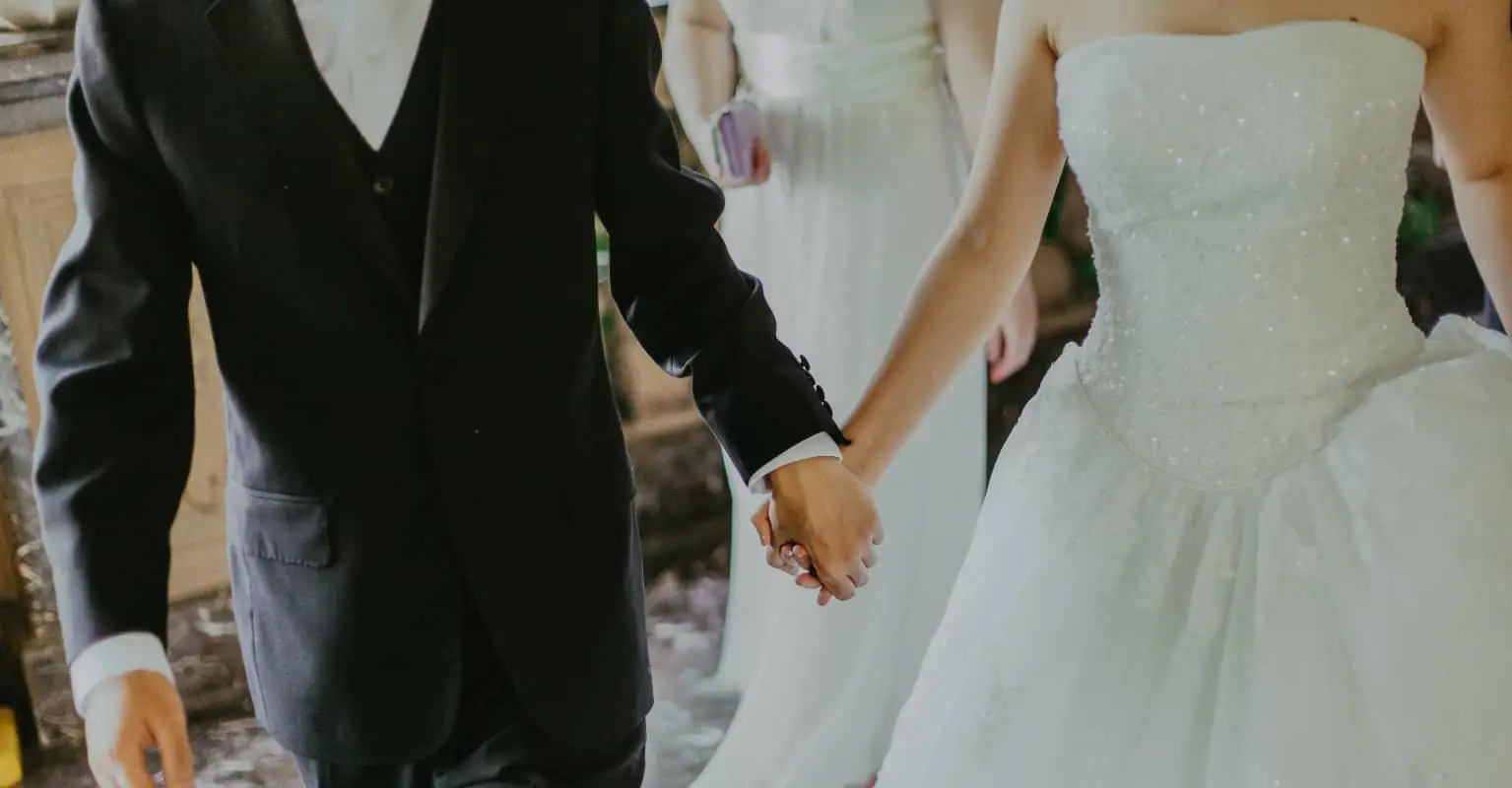Couple called out after trespassing on rail lines to pose for wedding photos