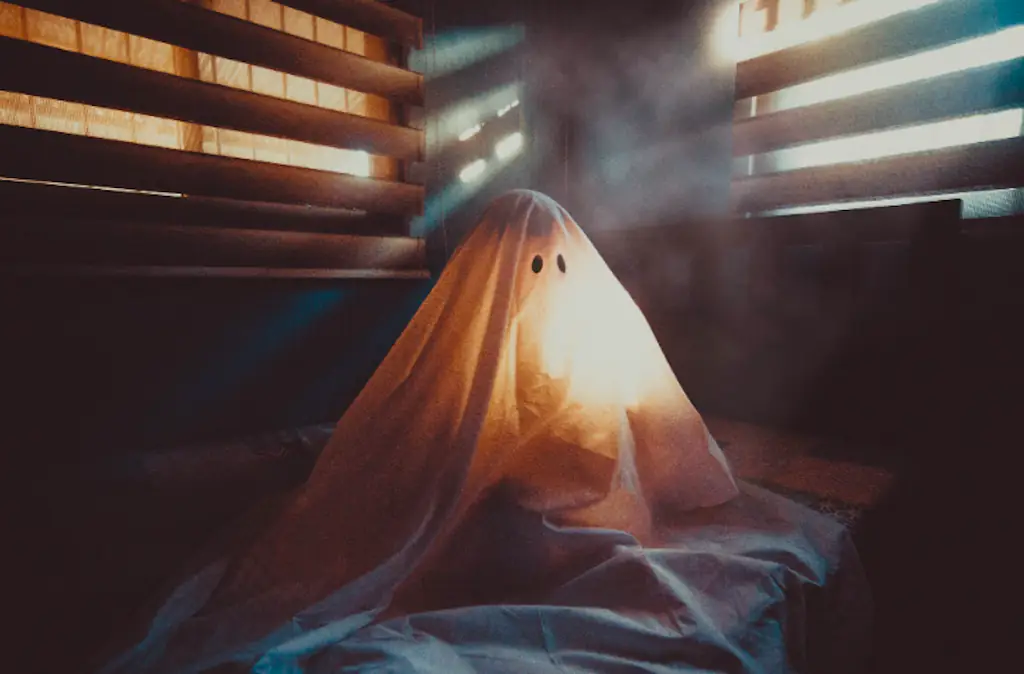 A person under a sheet.