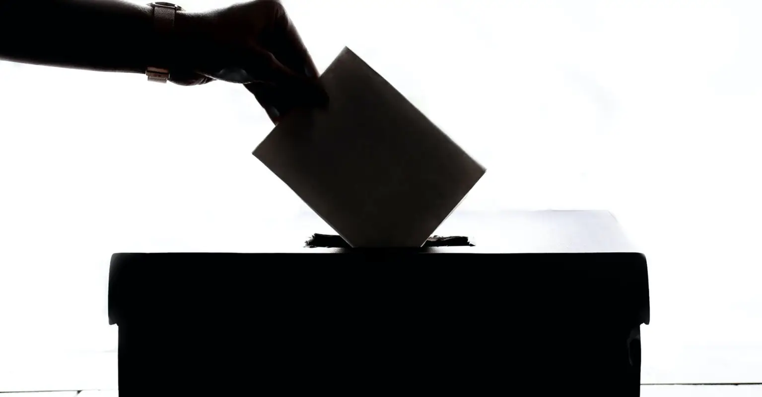 Voters in Philadelphia do the 'Cha Cha Slide' while waiting to cast ballots