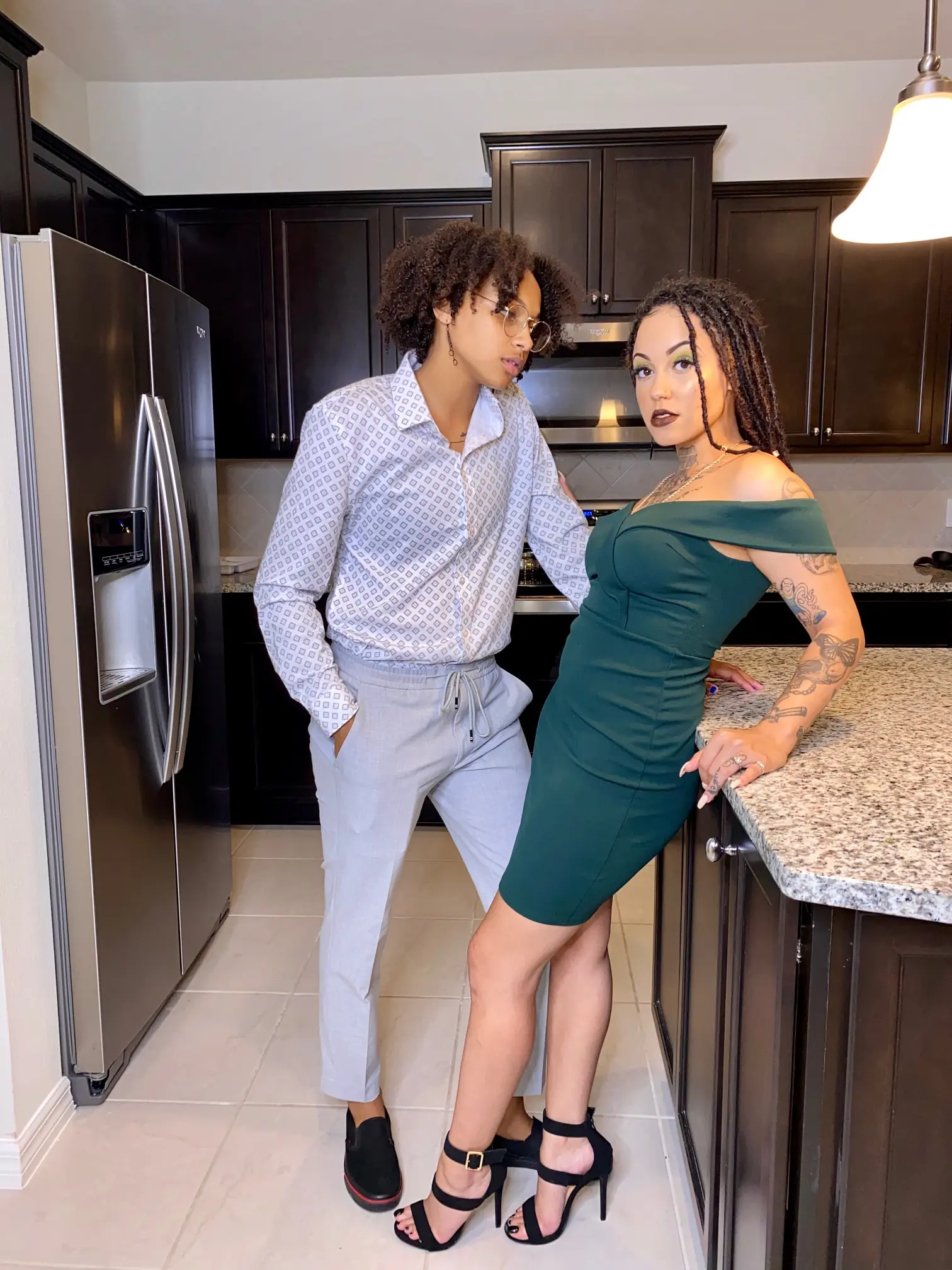 Court and Lex in a kitchen.