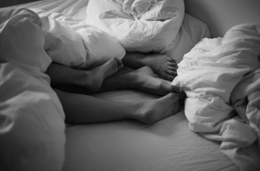 Feet in bed.
