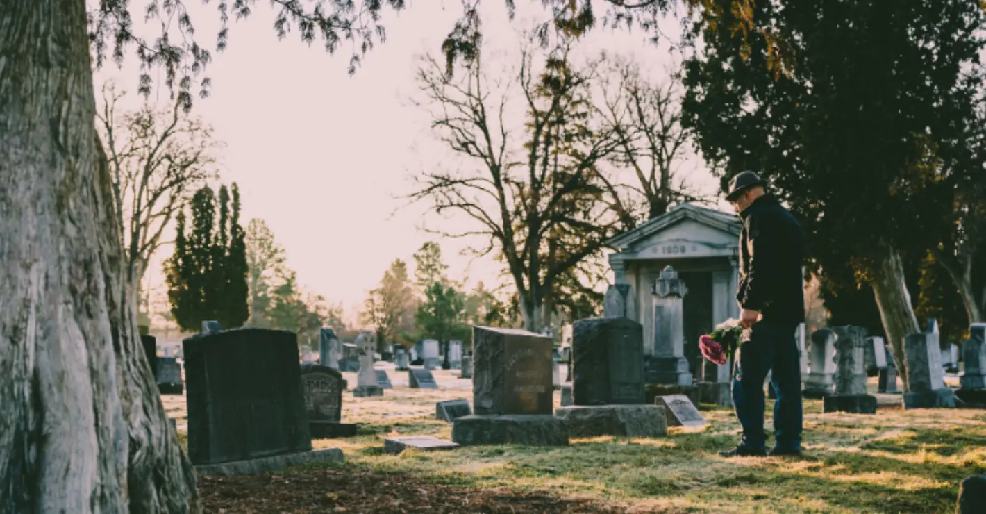 Son told off for moving chair to comfort heartbroken mother at father's funeral