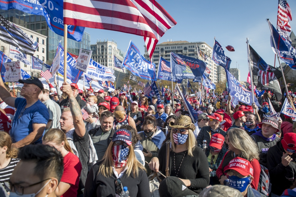 People talk part in pro-Trump march