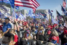 People talk part in pro-Trump march