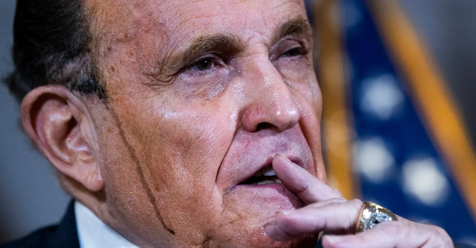 Viewers spot Rudy Giuliani's 'hair dye' running down his face at last night's news conference