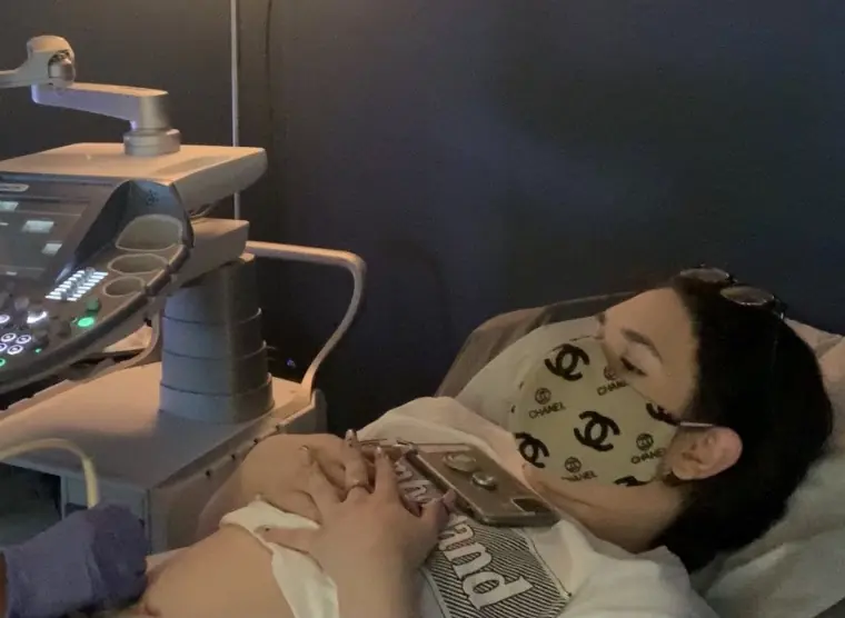 A woman having a baby scan.