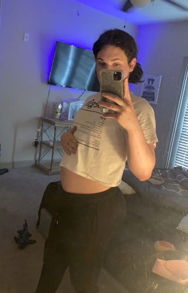 A woman with a baby bump.