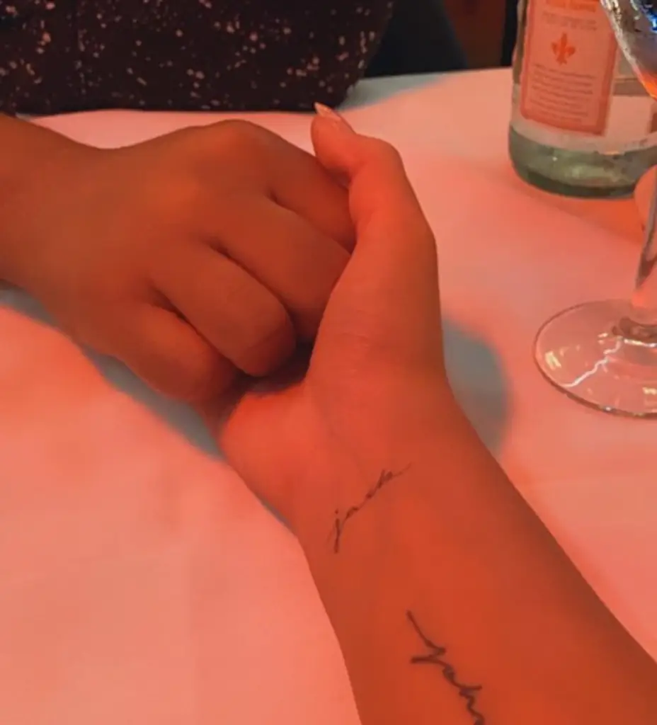Chrissy Teigen shows off her new tattoo tribute to unborn son Jack.