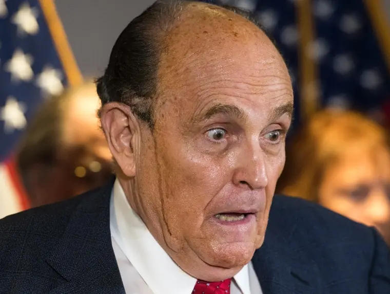 Rudy Giuliani's hair dye running down his face.