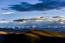 DINGRI, CHINA - AUGUST 26, 2020 - JIAWULA mountain pass is one of the most famous observation platforms for photographing Mount Everest. In the distance, there are four Himalayan peaks with an altitude of more than 8000 meters. Their order from left to right is: Makalu, Luozi, Qomolangma, zhuo