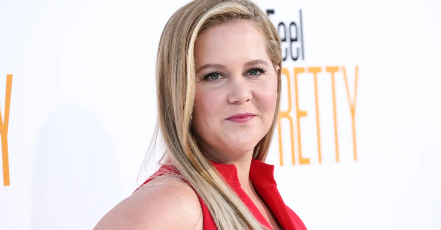 Amy Schumer apologizes to Hilaria Baldwin after using her underwear pic as a holiday card