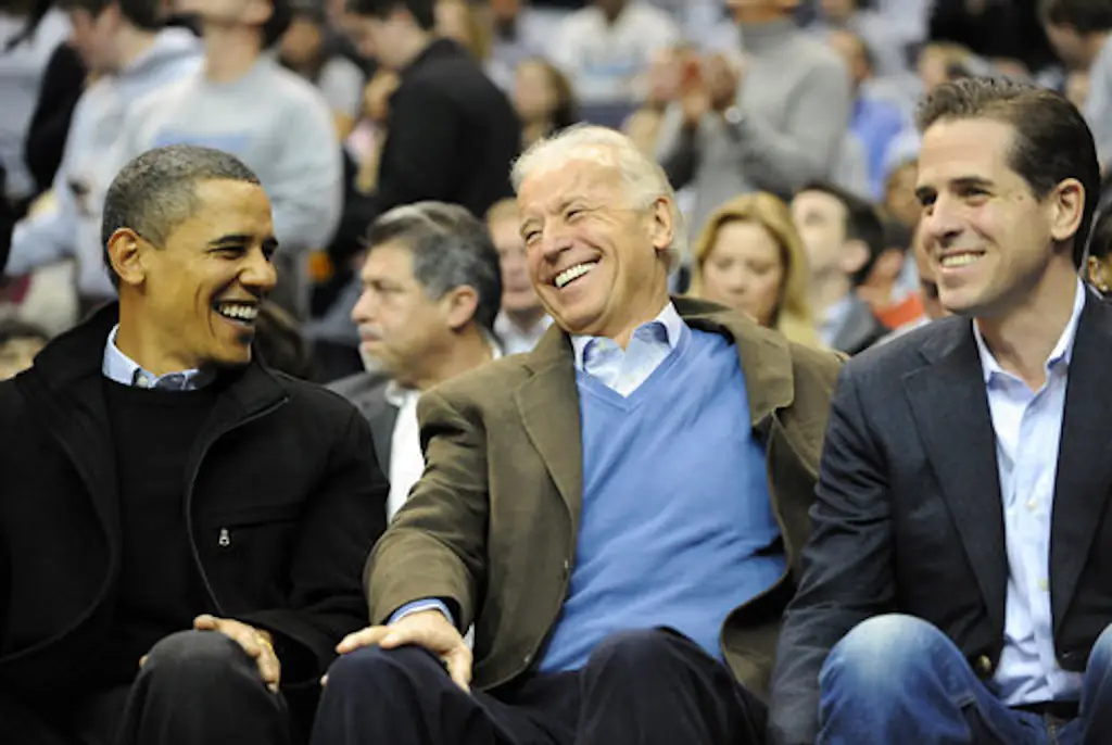 President Barack Obama, left, Vice President Joe Biden, center, and Hunter Biden share a laugh during the first half of the NCAA basketball game between Georgetown and Duke at the Verizon Center in Washington, D.C., Saturday January 30, 2010. Georgetown defeated Duke, 89-77. (Photo by Chuck Myers/MCT/Sipa USA)