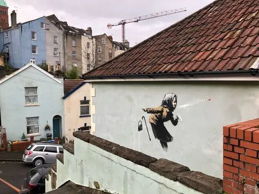 Graffiti that has appeared on a wall in Vale Street, Bristol, which could be the latest artwork from street artist Banksy, though the elusive street artist is yet to confirm whether he painted the mural.